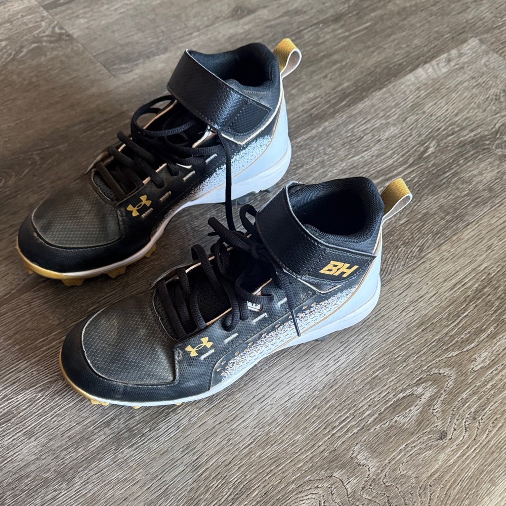 Under Armour Black and Gold Cleats